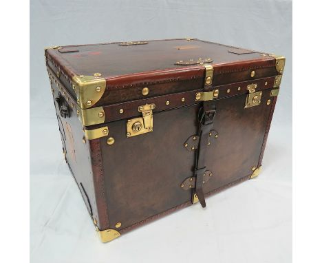 An Army and Navy Leather covered Travel Trunk