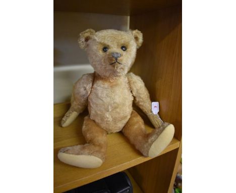 Steiff:&nbsp;a vintage straw filled golden blonde mohair bear, with four black claws, 46cm long. 