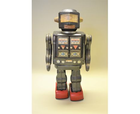 Robot:&nbsp;a vintage 'Made in Japan' tinplate robot, 30cm high. 