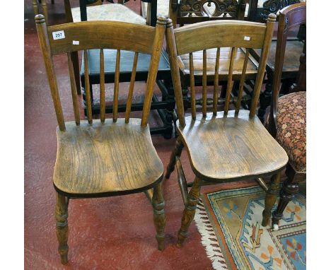 Pair of elm seated stick back chairs
