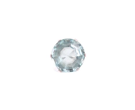 An aquamarine ring, comprises a round mix-cut aquamarine with a light greenish-blue body colour, approximately measuring 19.0