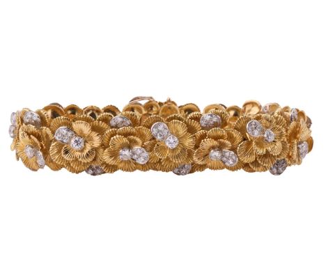 A Kutchinsky platinum and 18ct yellow gold diamond bracelet, comprises articulated links in form of layering flower heads wit