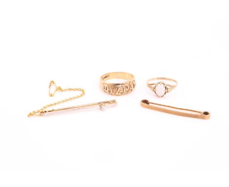 A 9 carat gold Mizpah ring; a single stone opal ring; a single stone diamond bar brooch and an engine-turned tie pin. Gross w