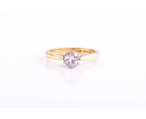 Cancer Research UK Charity lot - A solitaire diamond ring, set with a traditional cut diamond measuring 5.4-5.5mm with an est