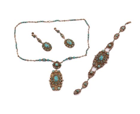 A suite of turquoise necklace, bracelet and a matching pair of earrings, consisting of a necklace where turquoise cabochons a