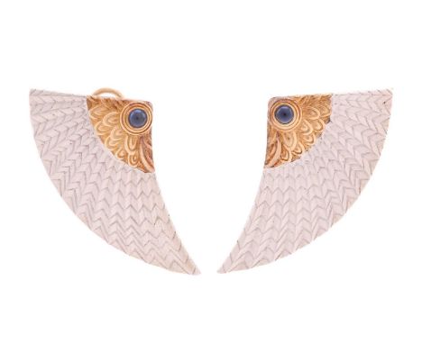 A pair of Erté 'Nile' earrings, each comprises round sapphire cabochon accents on the bi-coloured precious metal art deco sty