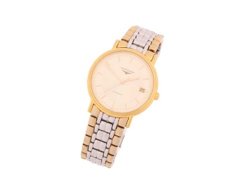 A Longines Présence automatic wristwatch with a swiss made automatic movement set into a bi-metal case measuring 34.5mm, with