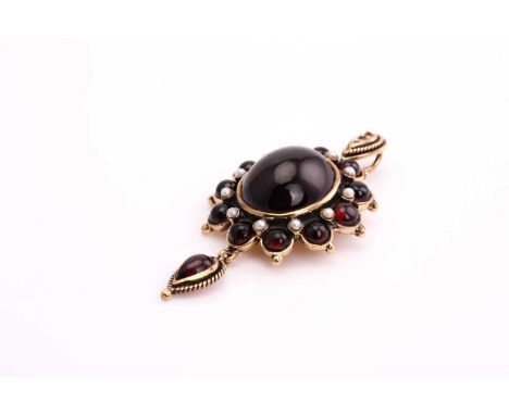 A garnet and split pearls pendant, consisting of a dark red oval garnet cabochon, approximately measuring 13.6 x 11.5 mm, rub