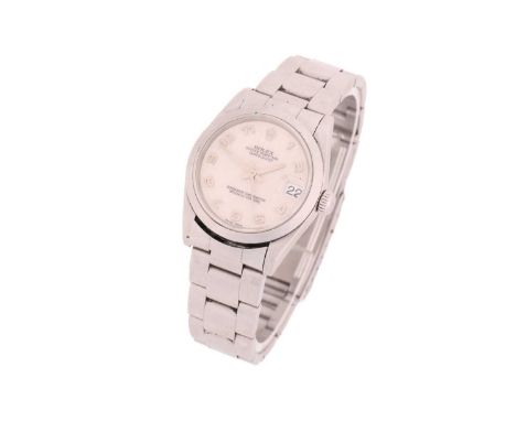 A Ladys Rolex 31 DateJust, with a Swiss-made automatic movement in a steel case measuring 31mm with a light cream/pink Rolex 