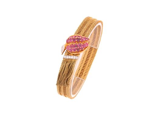 A Kutchinsky ruby and diamond slide bracelet, comprises an 18ct yellow gold woven link terminates with a white gold mount pav