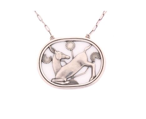 Georg Jensen - a necklace with kneeling deer and flowers, attached to a cable chain and toggle clasp, designed by Arno Malino
