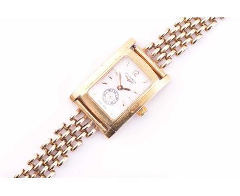 An 18ct yellow gold Longines lady's wristwatch with a Swiss-made quartz movement in a rectangle tank style case measuring 20 