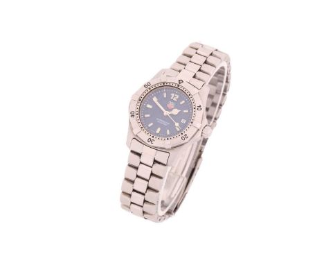 A lady's Tag Heuer professional 2000 series, 200m, with a Swiss quartz movement in a 28mm steel case with a blue dial and lum