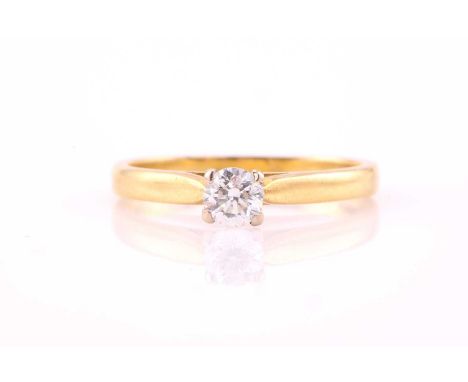 A diamond solitaire ring, consisting of a white round brilliant diamond approximately weighs 0.29ct, claw set on an 18ct whit