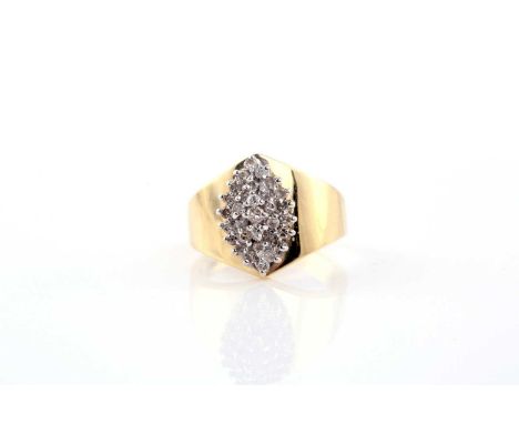 A diamond dress ring; the central marquise shaped cluster composed of three tiers of round brilliant cut diamonds in claw mou