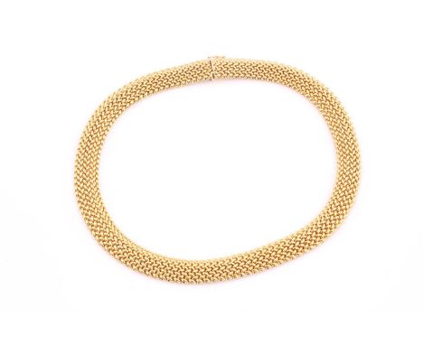 An Uno-A-Erre 18ct yellow gold mesh necklace, consisting of a woven mesh chain, fastened with a discrete groove and tongue cl