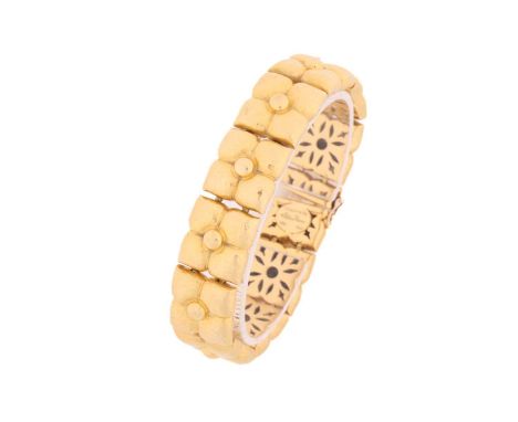 A Tiffany &amp; Co. Paloma Picasso yellow gold flower bracelet, comprised of puffed up flower-shaped links with a bright hamm