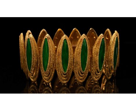 A Kutchinsky enamelled and textured 18ct gold link bracelet, consists of green enamel panels on textured geometrical hinged l