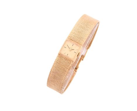 A lady's 9ct yellow gold Omega wristwatch and bracelet with a hand-wound caliber 484 movement in a 14mm square case with gold