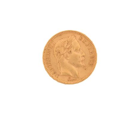 A French Twenty Franc Paris Mint gold bullion coin, Laureate head portrait of Napoleon III on the obverse and imperial coat o