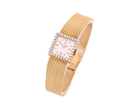 An Omega diamond set dress watch, with a Swiss-made hand-wound movement caliber 483, in a yellow metal square case stamped '1