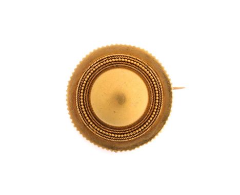 An Etruscan revival gold brooch, consisting of a round form dome in the centre, with applied wirework and granulation details