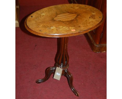 An early Victorian figured walnut and floral satinwood inlaid oval pedestal tilt top pedestal tripod occasional table (top an