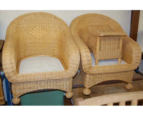 A contemporary wicker conservatory suite comprising two seater sofa, pair of armchairs, footstool and an oval table (lacking 