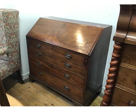 A George III mahogany bureau, the plain top above a fall front enclosing a fitted interior above four graduated long drawers,