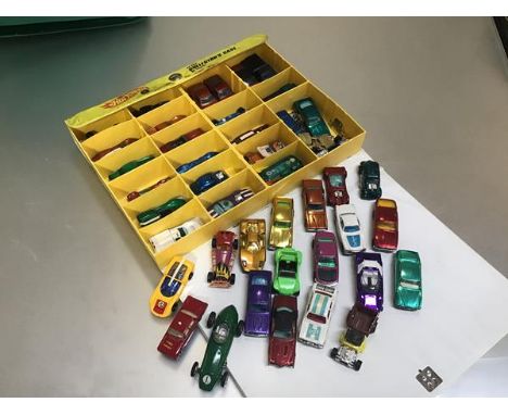 A 24 Collector's case by Mattel, Hotwheels, Fastest Metal Cars in the World, carry case complete with a collection of model c