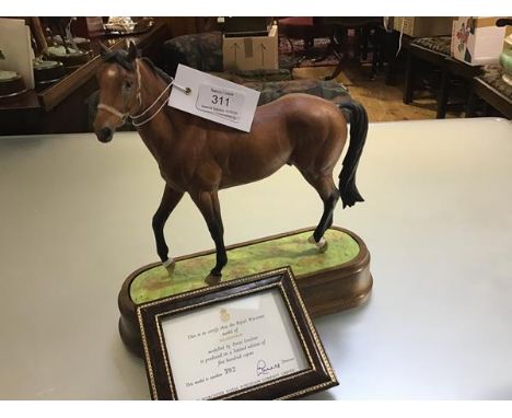 A Royal Worcester limited edition porcelain model, Nijinsky, modelled by Doris Lindner, mounted on wooden stand, with certifi