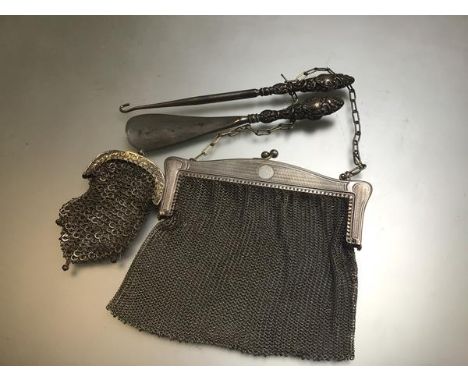 A Chester silver handled button hook and shoe horn, a white metal lady's chainmail purse complete with chain and similar deco