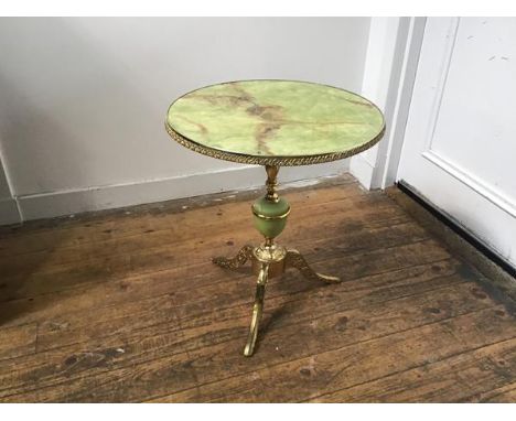 A 1960s brass plated metal faux onyx pedestal table on brass plated tripod support (h.56cm x d.48cm)