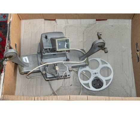 German Ising Projector Splicer for old movie films, to splice the films together.