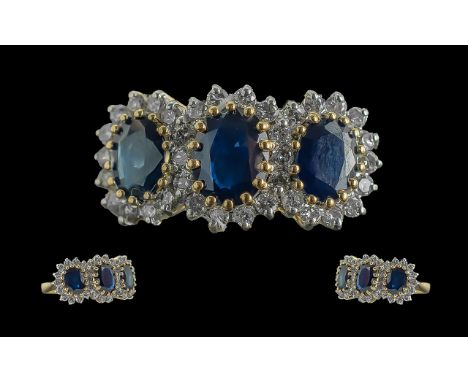 Ladies 18ct Yellow Gold Diamond and Sapphire Cluster Set Ring, full hallmark to interior of shank; consists of three blue nat