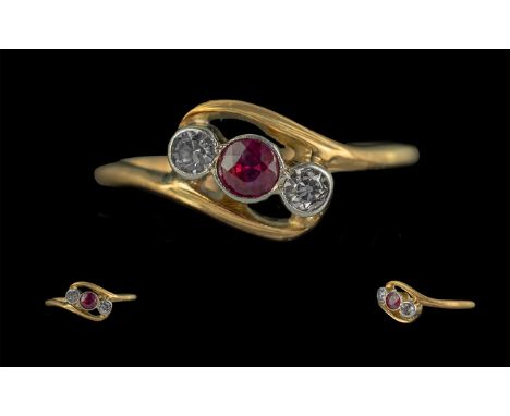 Ladies Attractive 18ct Gold Ruby and Diamond Set Ring. Not Marked but Tests 18ct. The Pave Set Ruby of Good Colour, With Two 