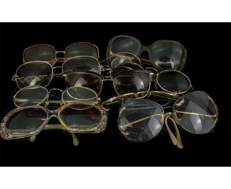 Collection of Vintage Pairs of Glasses &amp; Sunglasses, comprising a  pair of Prada sunglasses, Robert Cavalli sunglasses, o
