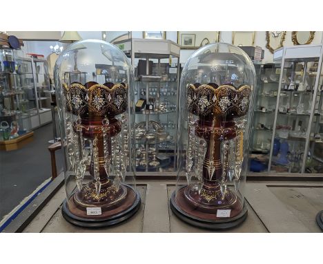 Pair of Ruby Victorian Lustres with crystal prisms, painted enamel and gilt decoration throughout, under glass domes, on base
