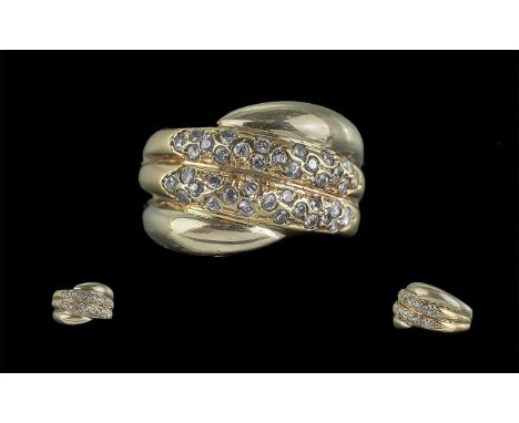 9ct Gold Pleasing Diamond Set Snake Ring, Marked 9ct to Shank. Est Diamond Weight 1.50 ct, Ring Size R. Weight 5.7 grams. Sha