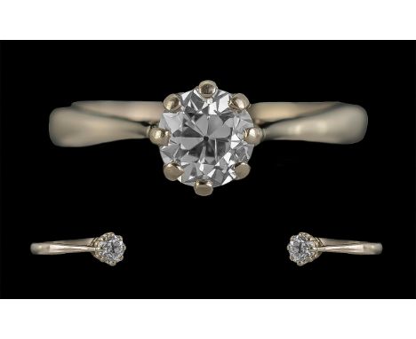 18ct Gold White Gold Single Stone Diamond Set Ring, marked 18ct to shank, the round faceted diamond of superb colour and clar