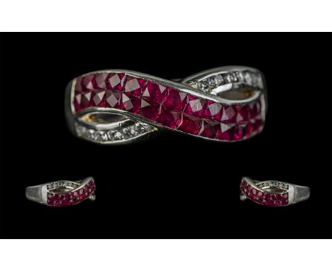 Ladies 18ct White Gold Attractive Ruby and Diamond Set Dress Ring, marked 750 - 18ct to shank, the ruby of excellent colour a