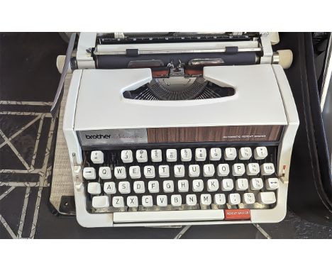 Three Vintage Typewriters, all in cases, makes include Erika, Texet and Brother 1510.