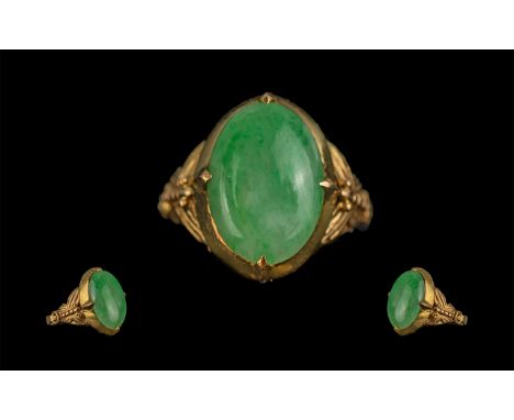 Chinese Pleasing Quality 22ct Gold Jade Set Ring.  Chinese gold character marks to interior of mount.  The oval shaped Jade s