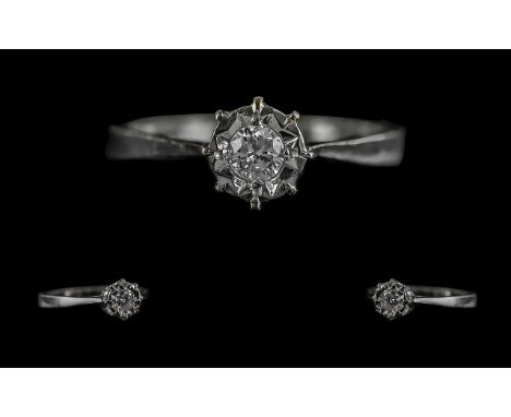 18ct White Gold Illusion Single Stone Diamond Set Ring, marked 18ct to shank; the diamonds of excellent colour and clarity, r