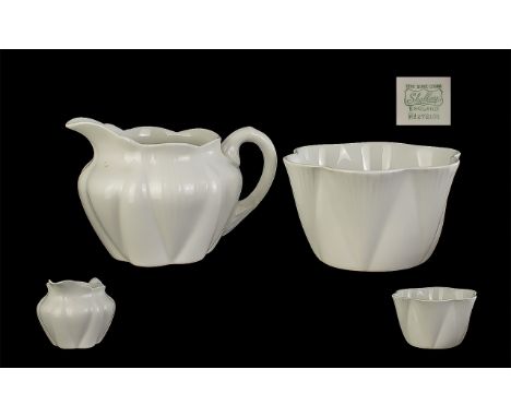 Small Collection of Porcelain, comprising a Shelley white milk jug and sugar bowl, No. 272101, a Limoges boxed Venice Simplon