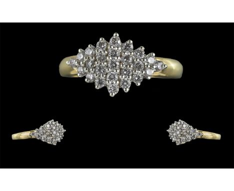 18ct Gold Attractive Diamond Set Cluster Ring, Marked 18ct to Interior of Shank. The Well Matched Diamonds of Good Colour and