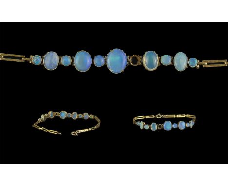 Antique Period Ladies Attractive 9ct Gold Opal - Moonstone Set Bracelet, Marked 9ct. The Graduated Opals - Moonstone of Excel