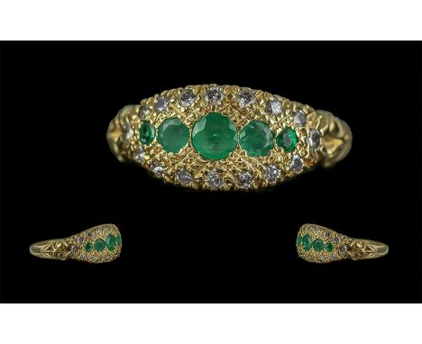 Antique Period Attractive 18ct Gold Emerald and Diamond Set Ring. Marked 18ct to Interior of Shank. The Five Graduated Pave S