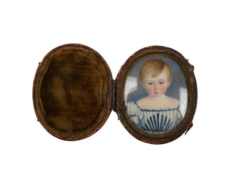 A Regency portrait miniature on ivory of a boy, oval, 4.6 X 3.7 cm, good condition, in a contemporary Morocco leather case. C