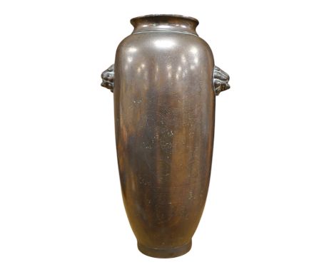 A tall 19th century Chinese silver inlaid bronze twin handled vase, signed ‘Shisou’ to the base, 30cm high. Condition - fair 